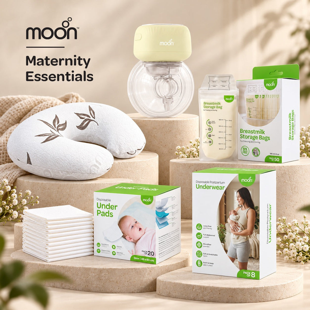MOON Maternity Essentials bundle with single wearable breast pump, bamboo-print feeding pillow, milk storage bags, underpads and postpartum briefs