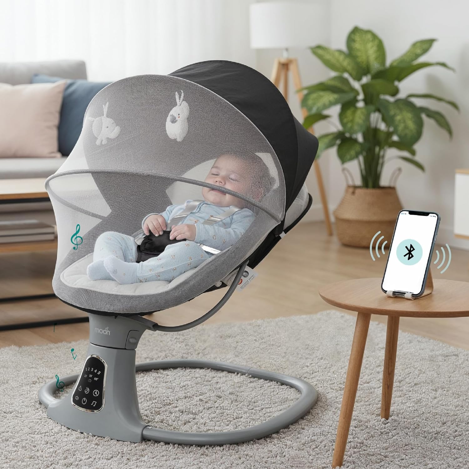 The Moon Brand Koze Baby Swing. 0m+, Holds upto 9kg. Gentle Swaying Motion. In Built Music System. Flexible Speed and Timer Settings. With Remote Control and Mosquito Net. Motion Sensor - The Moon Brand™