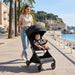 The MOON Brand Tripzi Carbon Fiber Cabin Stroller – Ultra-Lightweight, Travel-Ready Stroller with Easy Fold, Five-Point Safety Harness, Leather Handle for Babies 0–36 Months-Black