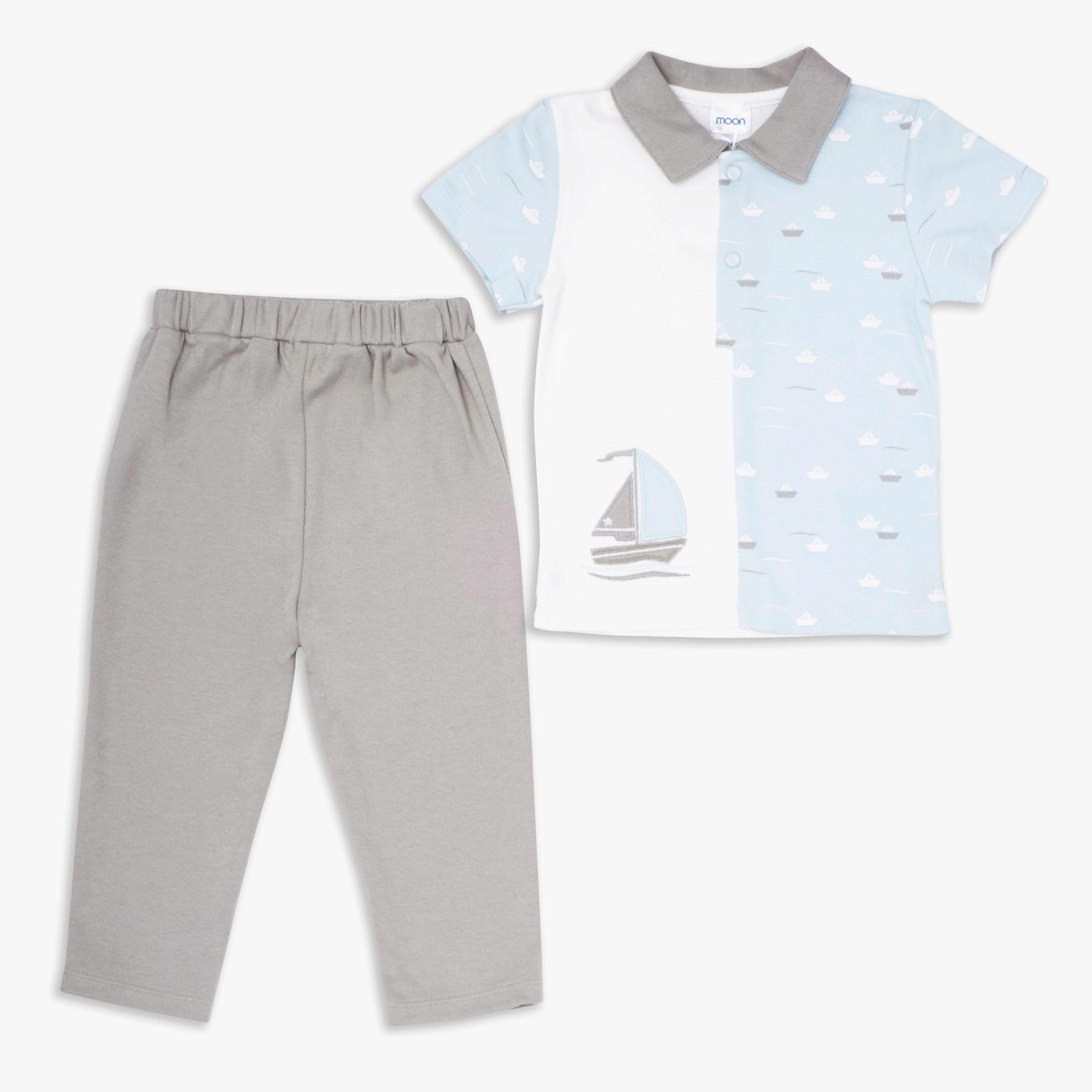 طقم بلوزة وبنطال باللون الأزرق المخضر